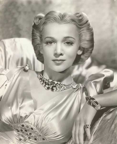 Carole Landis wearing a silk dress with jewels photo print.