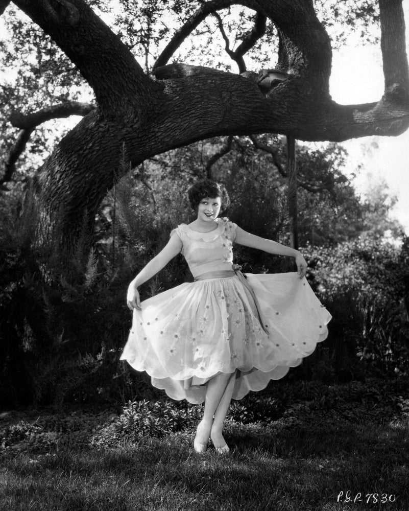 Clara Bow Under Tree Photo Print showcasing vintage Hollywood charm.