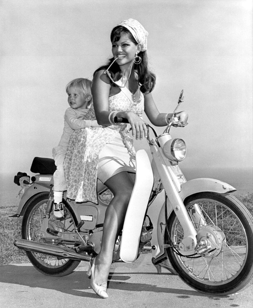 Claudia Cardinale Motorcycle Photo Print featuring classic cinema aesthetics.