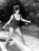 Claudia Cardinale Sidewalk Photo Print showcasing timeless elegance
