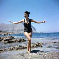 Claudia Cardinale Arms Out Photo Print capturing timeless elegance.