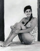 Claudia Cardinale in a white bathing suit photo print