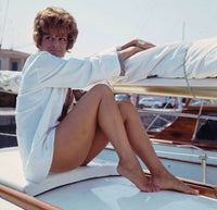 Claudia Cardinale White Boat Photo Print showcasing classic film elegance.