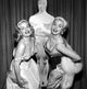 Cleo Moore Oscar Pose Photo Print showcasing classic Hollywood glamour.