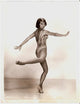 Photo print of Cyd Charisse dancing in a sequin one-piece outfit.