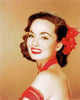 Ann Blyth Red Flowers Photo Print showcasing vivid red flowers.