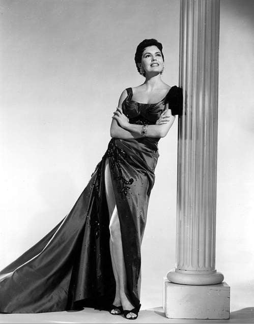 Cyd Charisse in black gown posed on pillar - classic Hollywood photo print.