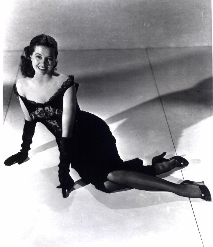 Cyd Charisse elegant photo print in black dress and gloves.