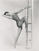 Cyd Charisse Leg on Ladder Photo Print showcasing classic Hollywood elegance.