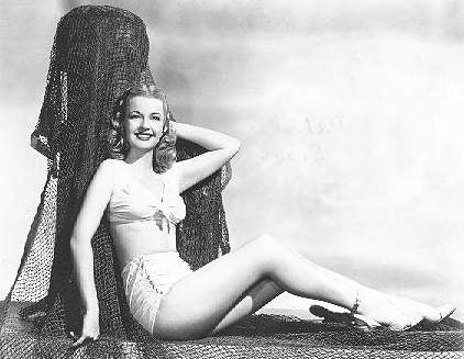 Dale Evans leaning against fishing nets photo print