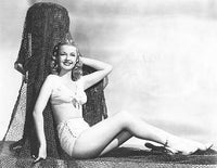 Dale Evans leaning against fishing nets photo print