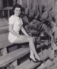 Ann-Margret Stairs Photo Print showcasing classic Hollywood elegance.