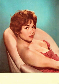 Dany Carrel Leaning Back in Chair Photo Print