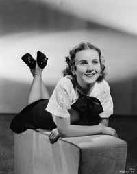 Deanna Durbin Laying Down Arms Crossed Photo Print