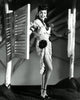 Ann Miller Saloon Doors 2 Photo Print showcasing classic Hollywood elegance.