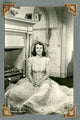 Deanna Durbin Fireplace Photo Print showcasing a classic film moment.