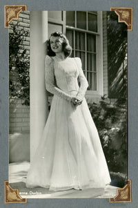 Deanna Durbin Leaning on Post Photo Print showcasing vintage Hollywood charm.