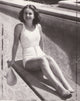Deanna Durbing sitting on a diving board photograph