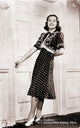 Deanna Durbin Holding Doorknob Photo Print showing vintage Hollywood charm.