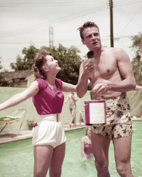 Debbie Reynolds talking to John Ericson photo print