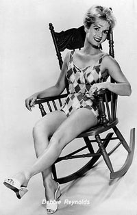Debbie Reynolds sitting in a rocking chair photo print