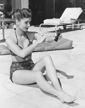 Debbie Reynolds Photo Print: Putting Sunblock On