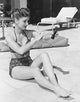 Debbie Reynolds Photo Print: Putting Sunblock On