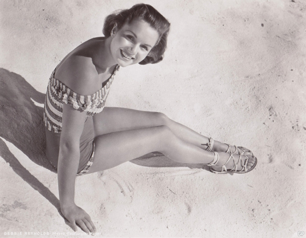 Debbie Reynolds Sitting on Beach Photo Print