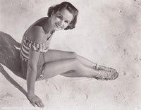 Debbie Reynolds Sitting on Beach Photo Print