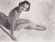 Debbie Reynolds Sitting on Beach Photo Print