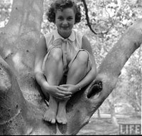 Debbie Reynolds Sitting in a Tree Photo Print, capturing her joyful spirit.