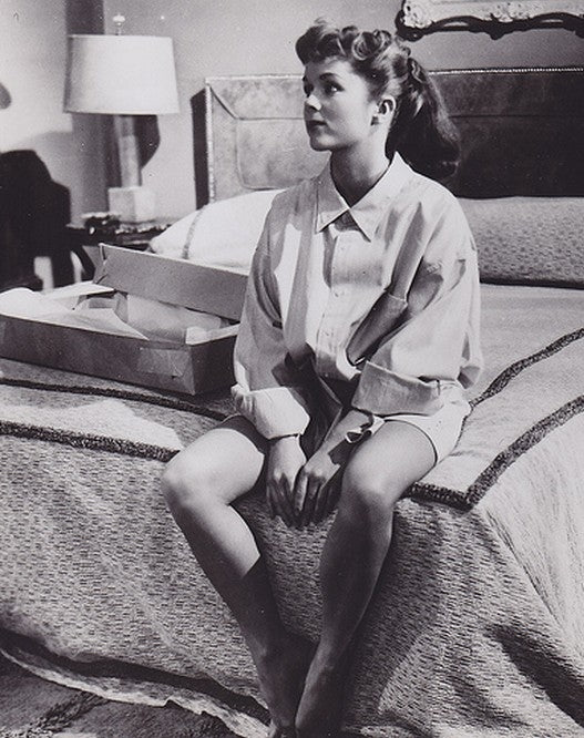 Debbie Reynolds Sitting on Bed Photo Print
