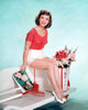 Debbie Reynolds in red shirt and white shorts photo print