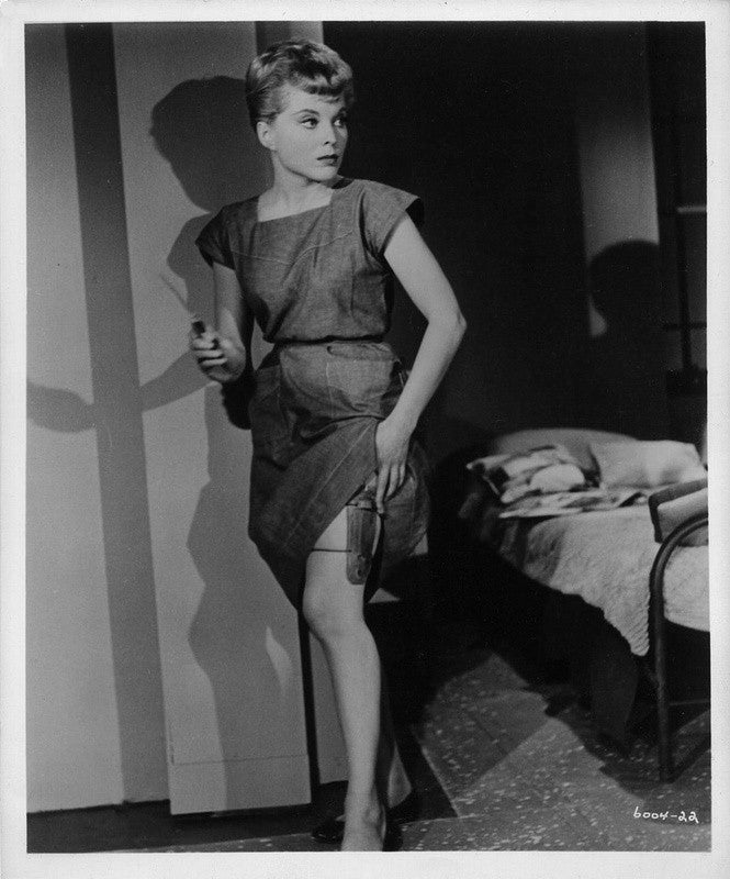 Debra Paget holding knife photo print in vintage style.