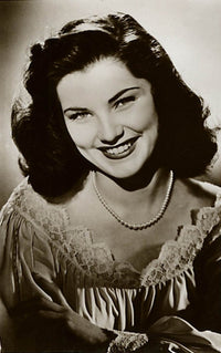 Debra Paget Pearl Necklace Photo Print showcasing classic Hollywood elegance.