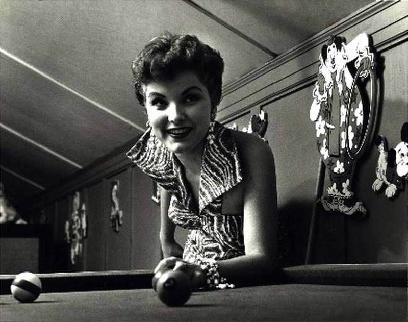 Debra Paget Playing Pool Photo Print showcasing vintage Hollywood charm.