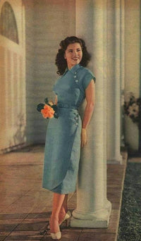 Debra Paget photo print in blue dress with orange flower.