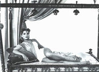 Debra Paget lounging on pillows photo print