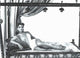 Debra Paget lounging on pillows photo print