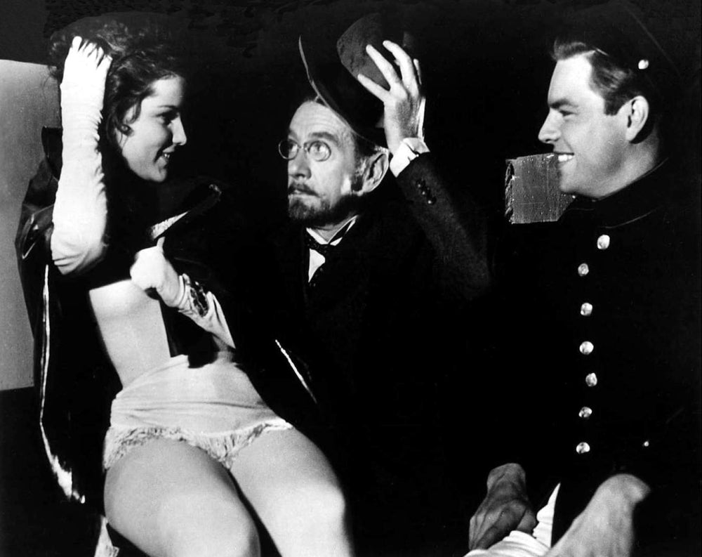Debra Paget Looking at Two Men Photo Print