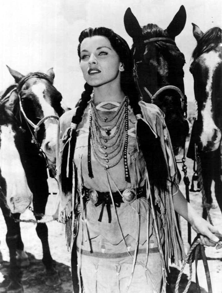 Debra Paget With Horses Photo Print showcasing classic Hollywood elegance.