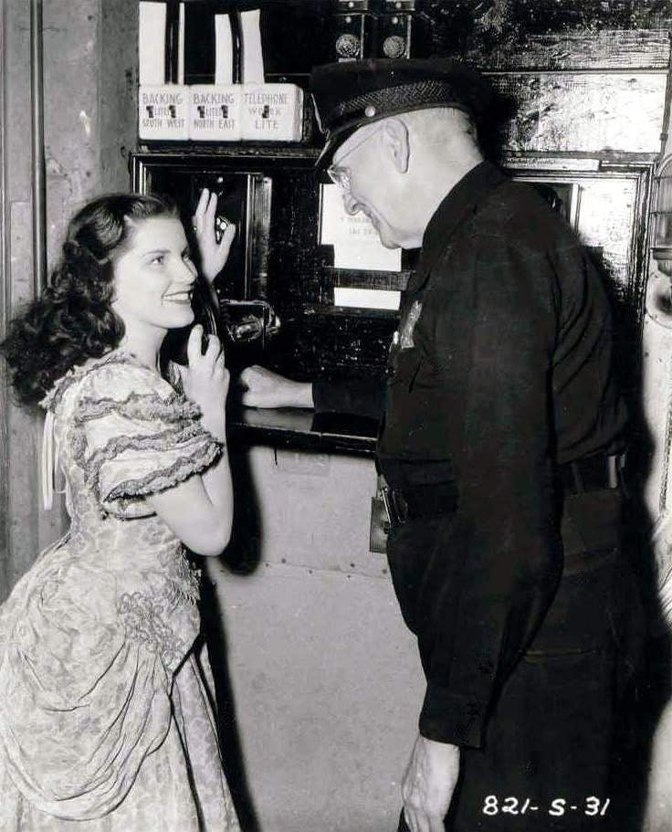 Debra Paget Talking to an Older Man Photo Print