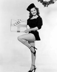 Debra Paget One Leg Holding Box Photo Print showing classic Hollywood charm.