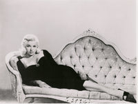 Diana Dors On Couch Photo Print showcasing vintage elegance.
