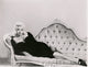 Diana Dors On Couch Photo Print showcasing vintage elegance.