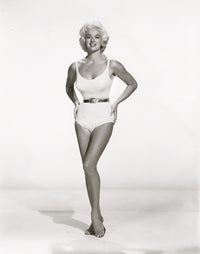 Diana Dors in a stunning white one piece photo print.
