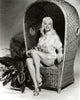 Diana Dors Wicker Chair Photo Print showcasing classic Hollywood elegance.