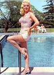 Diana Dors Poolside Colorized Photo Print showcasing classic Hollywood elegance.