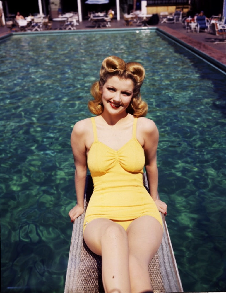 Dolores Moran in yellow bikini on diving board vintage photo print.