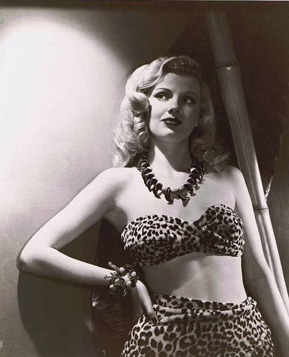 Doloras Moran Cheeta Two-Piece Photo Print showcasing a beautiful cheetah.